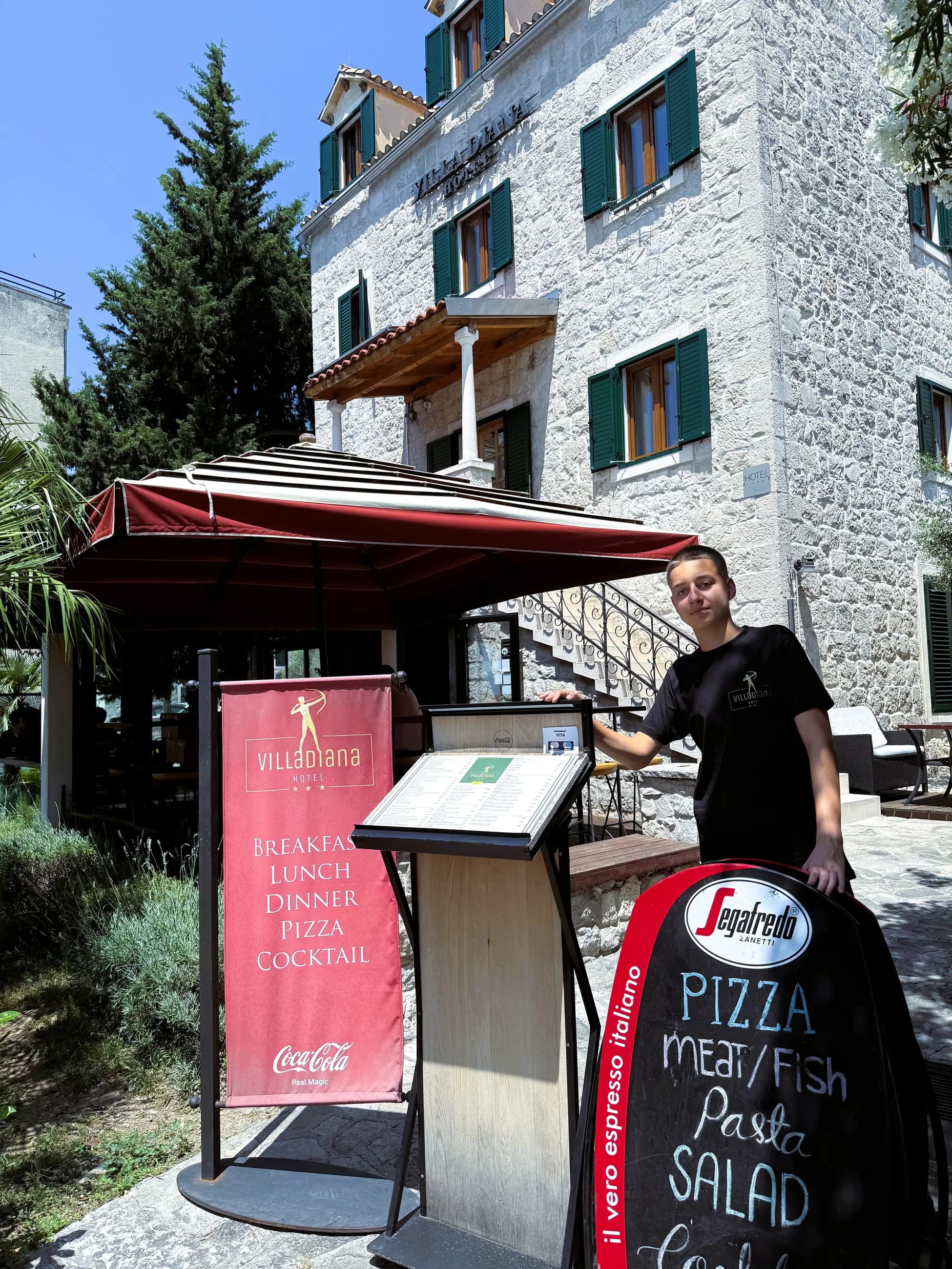The pizzeria entrance with the menu board, by day, Pizzeria Villa Diana, Lučac, Split