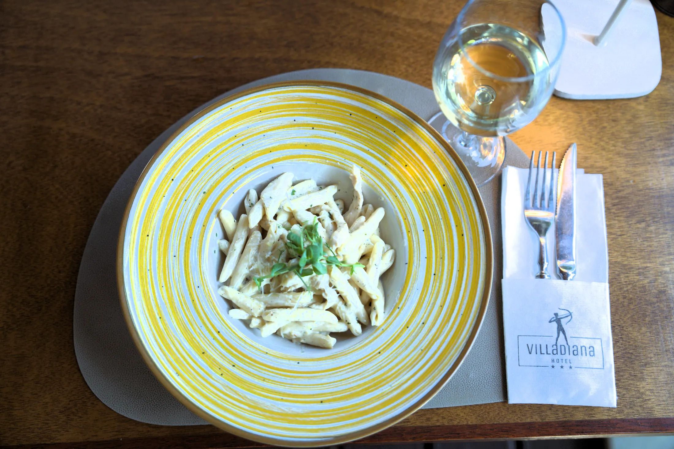 Penne in a creamy sauce, on a gold-rimmed plate, Pizzeria Villa Diana, Lučac, Split