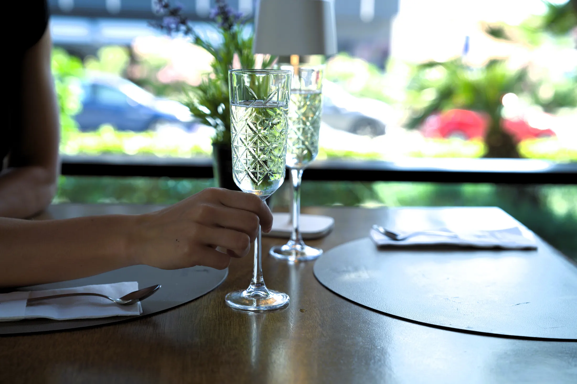 A glass of sparkling wine by the window, the garden behind, Pizzeria Villa Diana, Lučac, Split