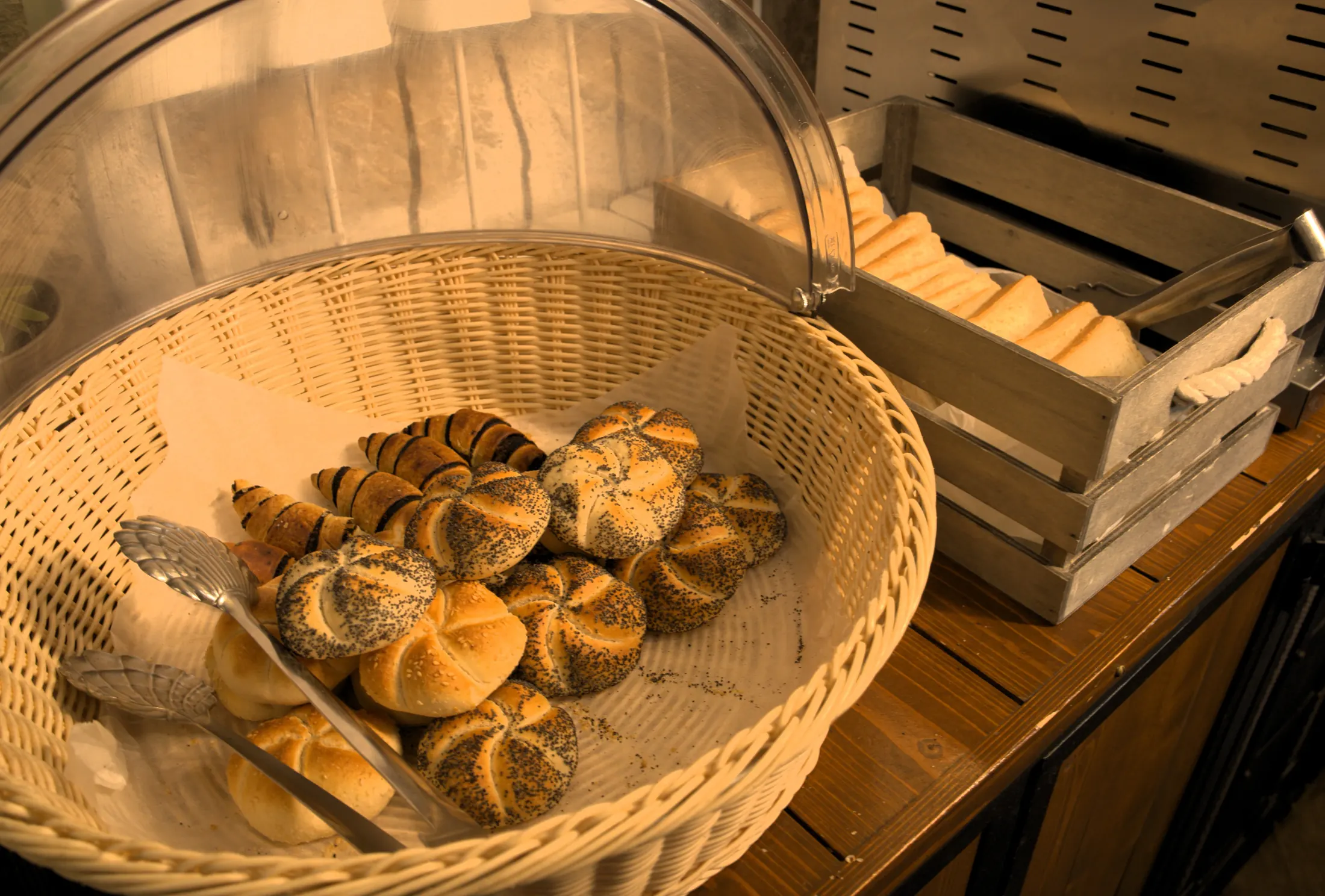 A basket of rolls and bread on the breakfast buffet, Pizzeria Villa Diana, Lučac, Split