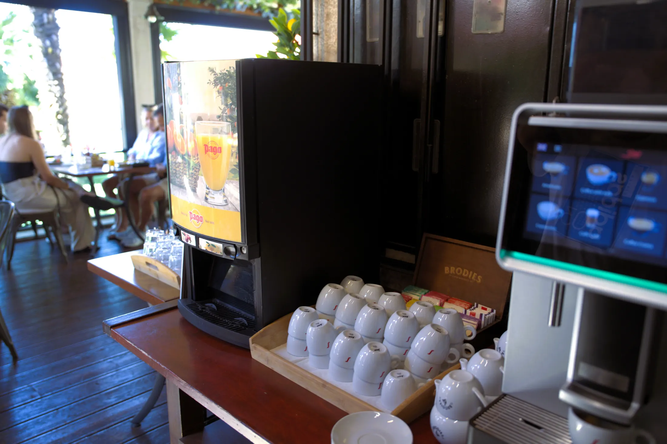 The coffee and juice machine with cups, beside the tables, Pizzeria Villa Diana, Lučac, Split