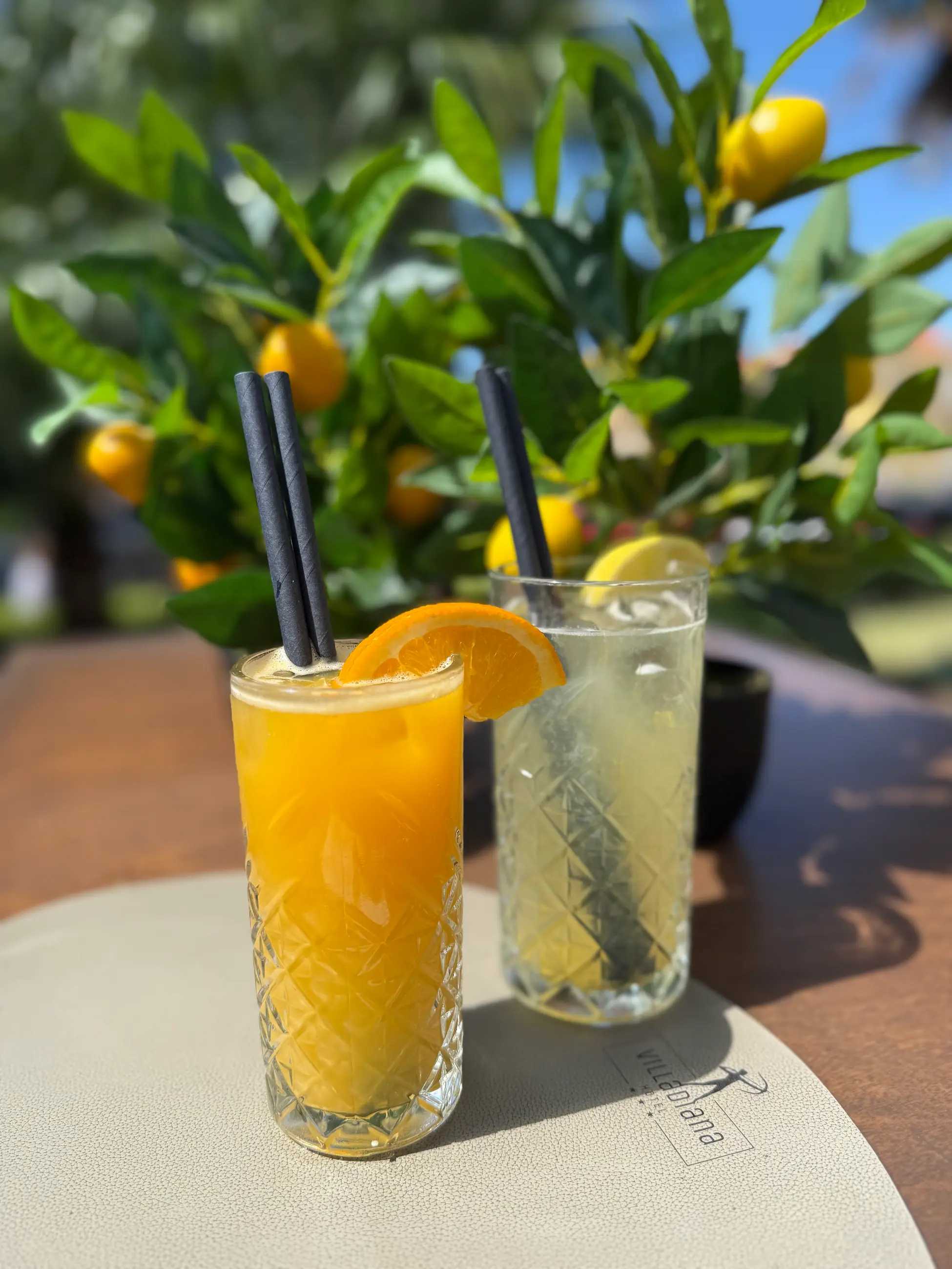 Two glasses of drinks on a table in the garden, Pizzeria Villa Diana, Lučac, Split