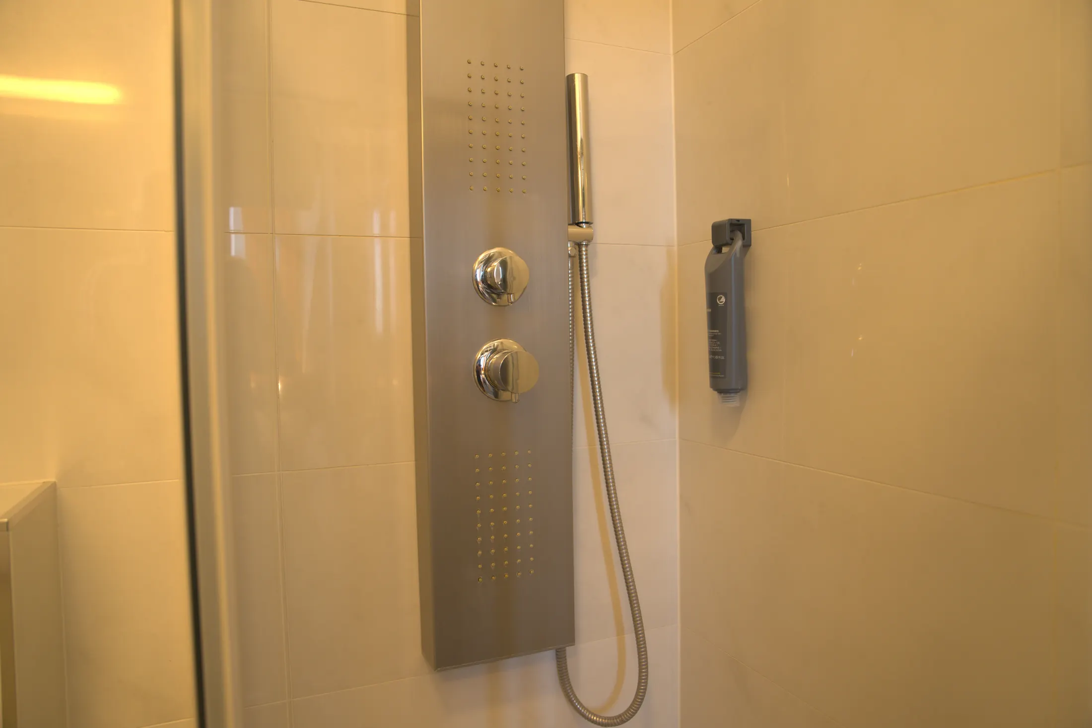 The shower column with a hand shower in the cabin, Hotel Villa Diana, Lučac, Split