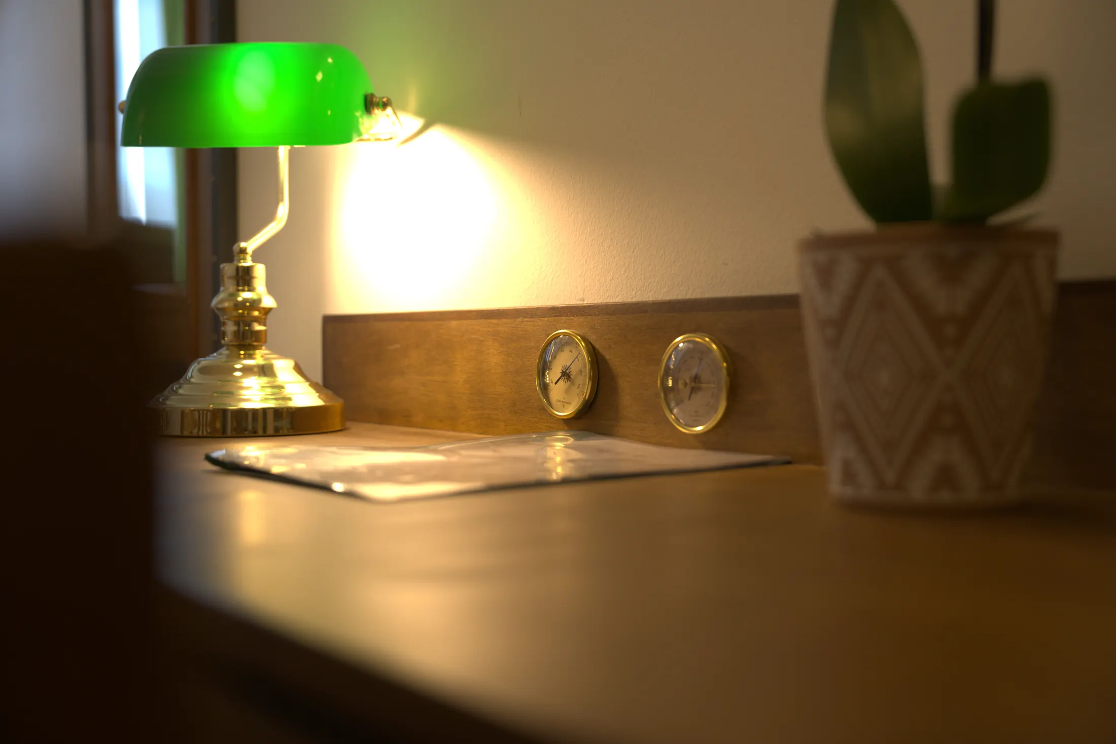 The desk with a green lamp, barometer and orchid, Hotel Villa Diana, Lučac, Split