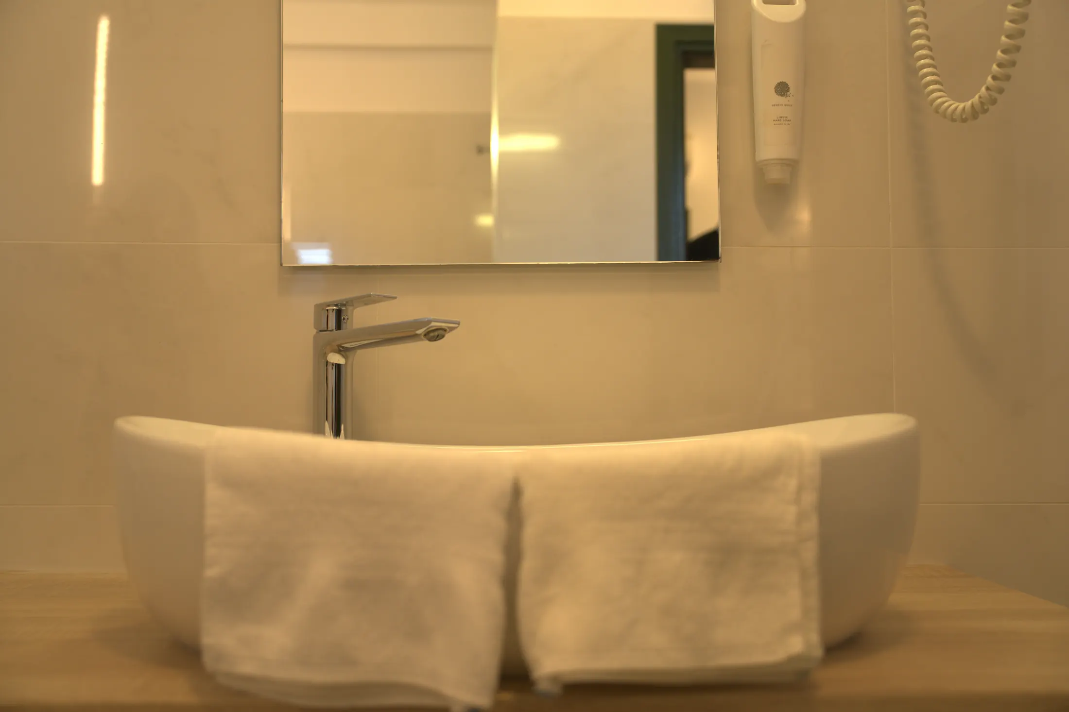 The washbasin with mirror and hairdryer, Hotel Villa Diana, Lučac, Split