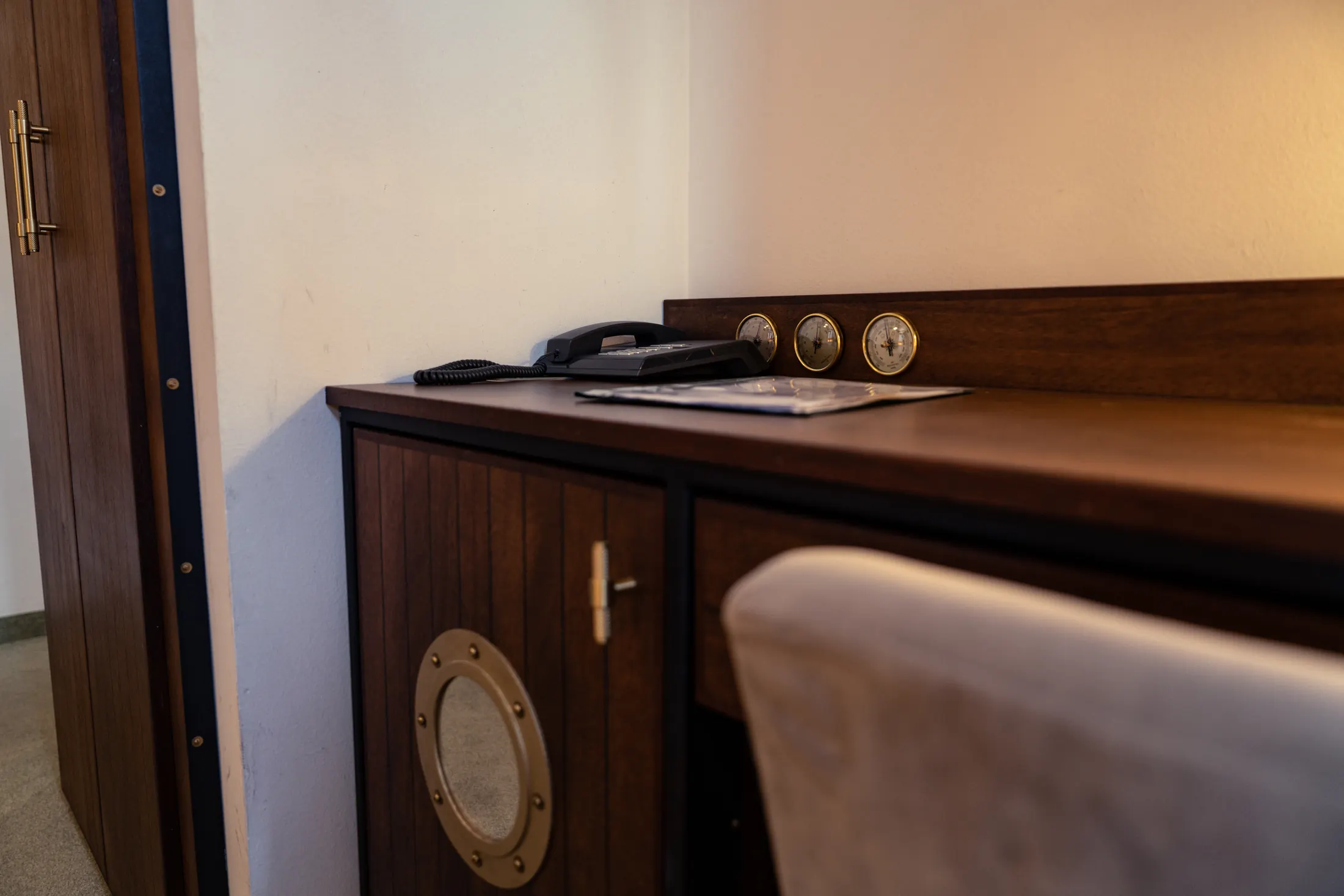 The desk with a telephone and barometer, beside the wardrobe, Hotel Villa Diana, Lučac, Split